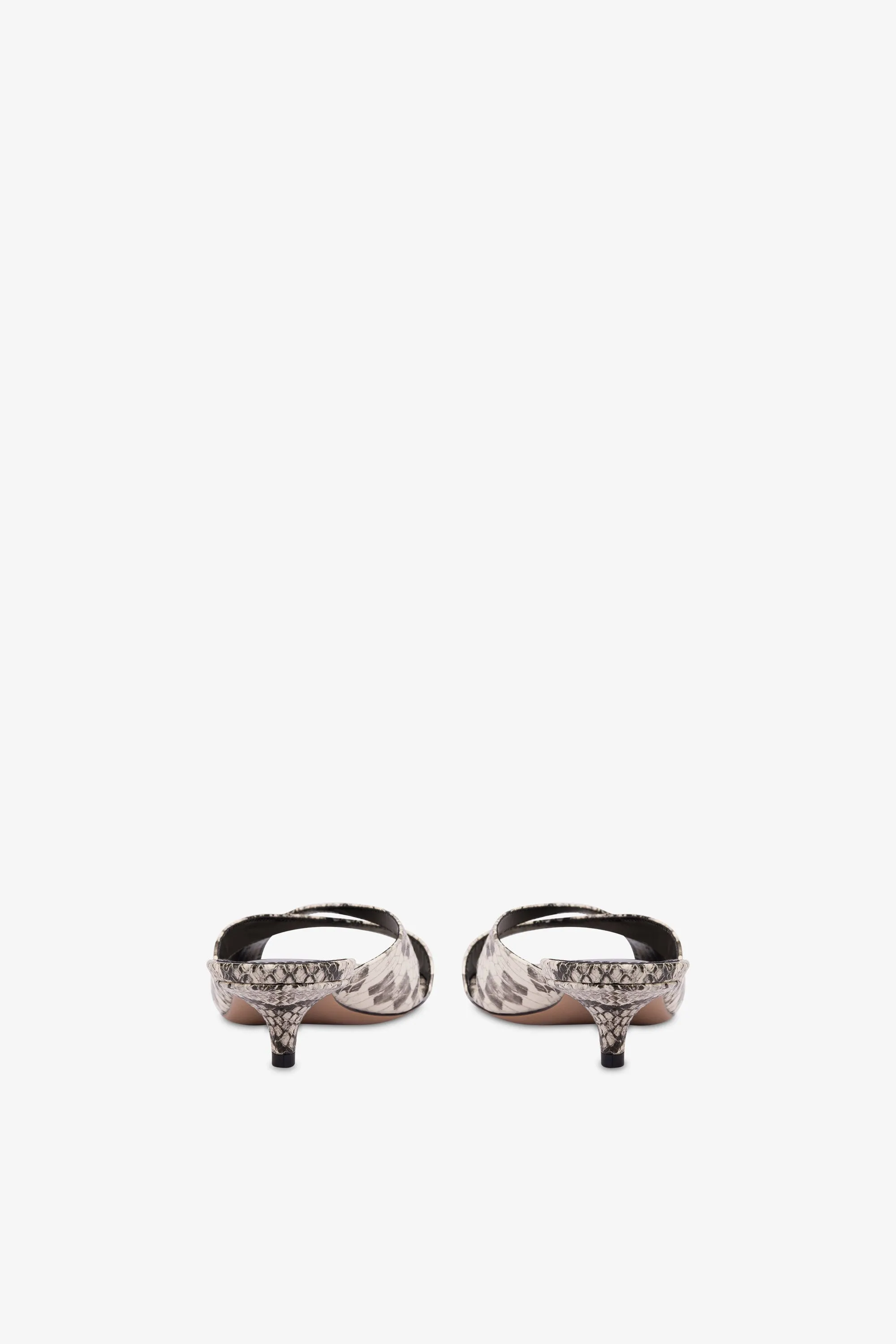 Mules in white python-print leather