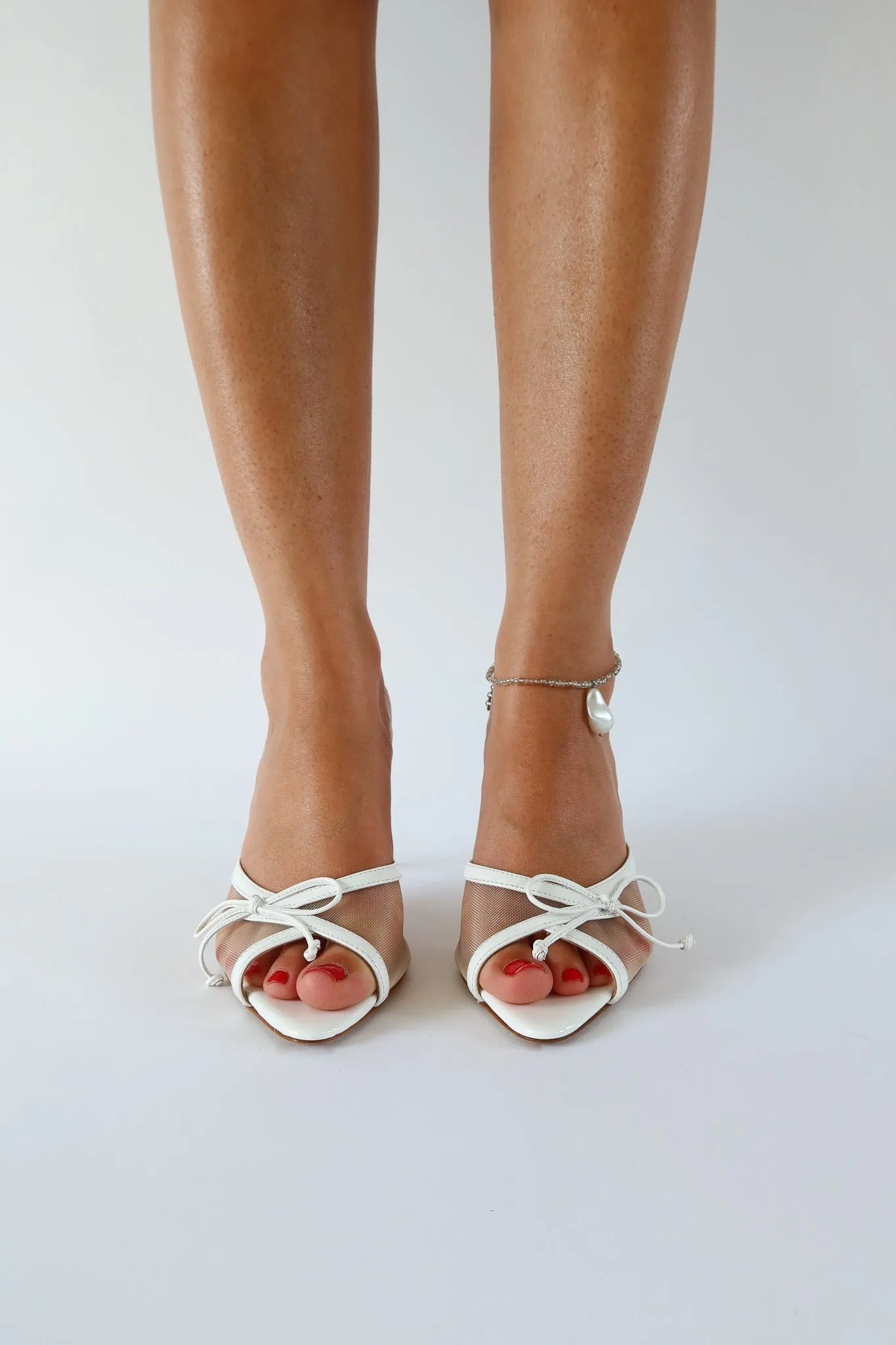 pony white heeled bow sandal