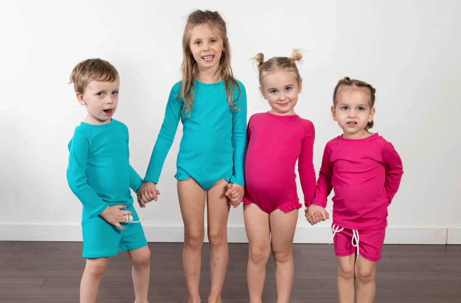 "Brights" Ribbed Blue Curaco Ruffle Rashguard Suit